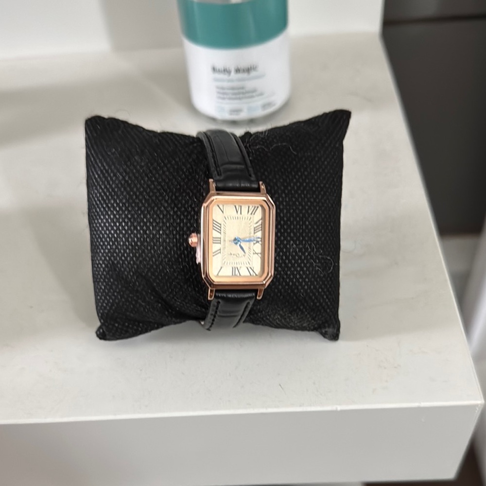 Elegant Black and Gold Watch